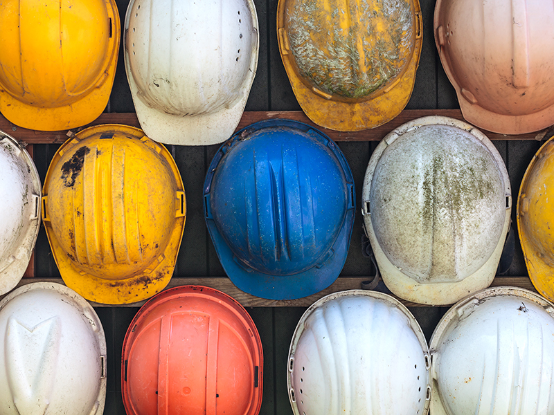 Rows of used hard hats